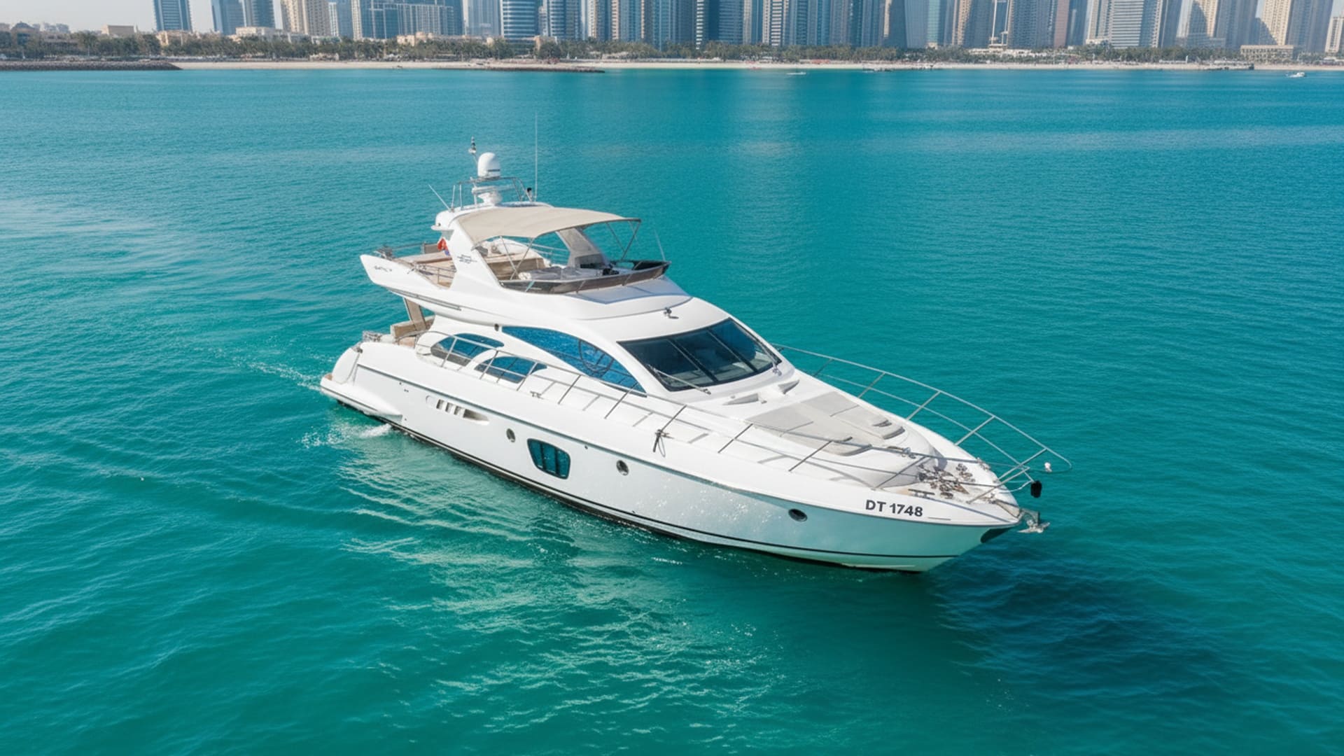 Aerial view of Silver Duchess 55 ft yacht cruising Dubai Marina