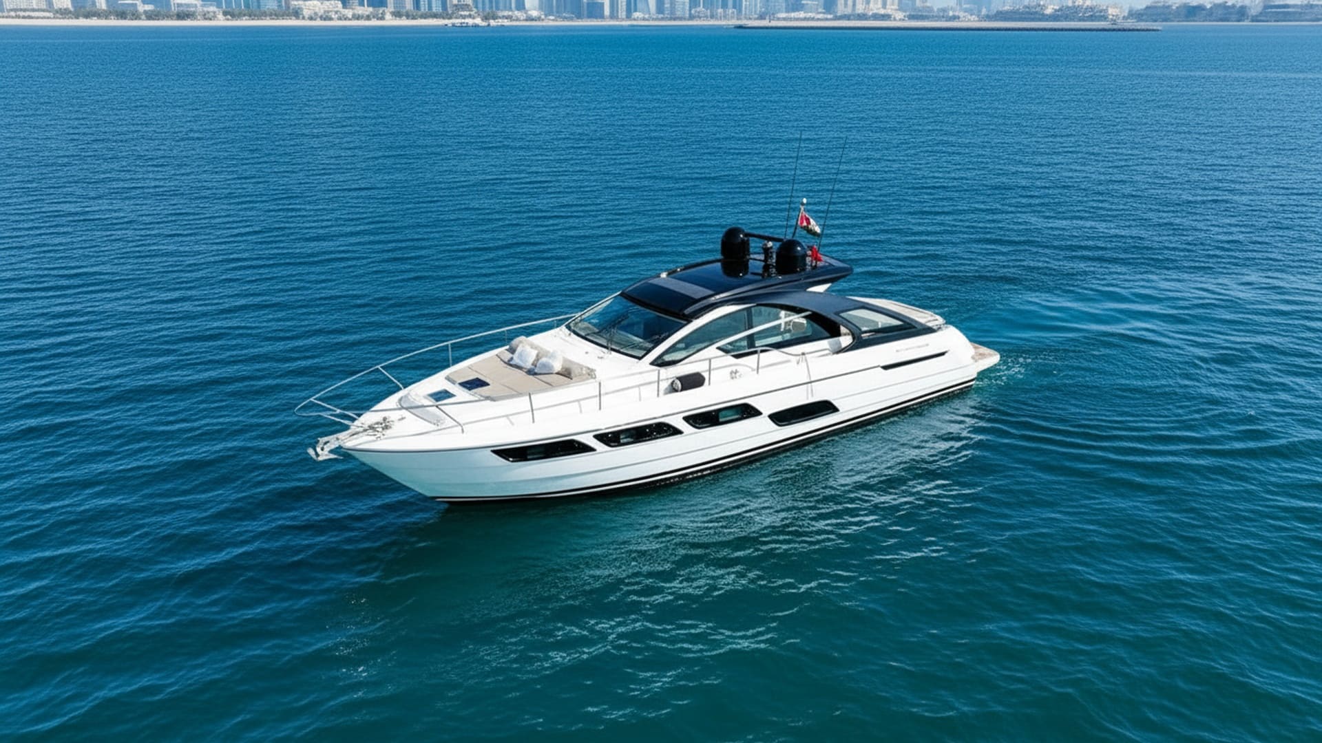 Aerial view of Ocean Seeker 52 ft cruising Dubai Marina
